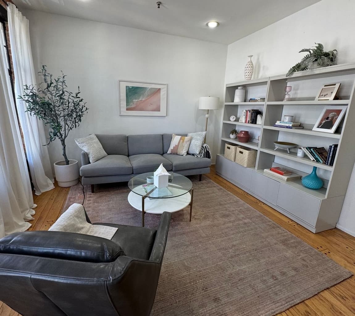 Thoughtfully designed Santa Monica office space featuring comfortable seating, books, and serene decor